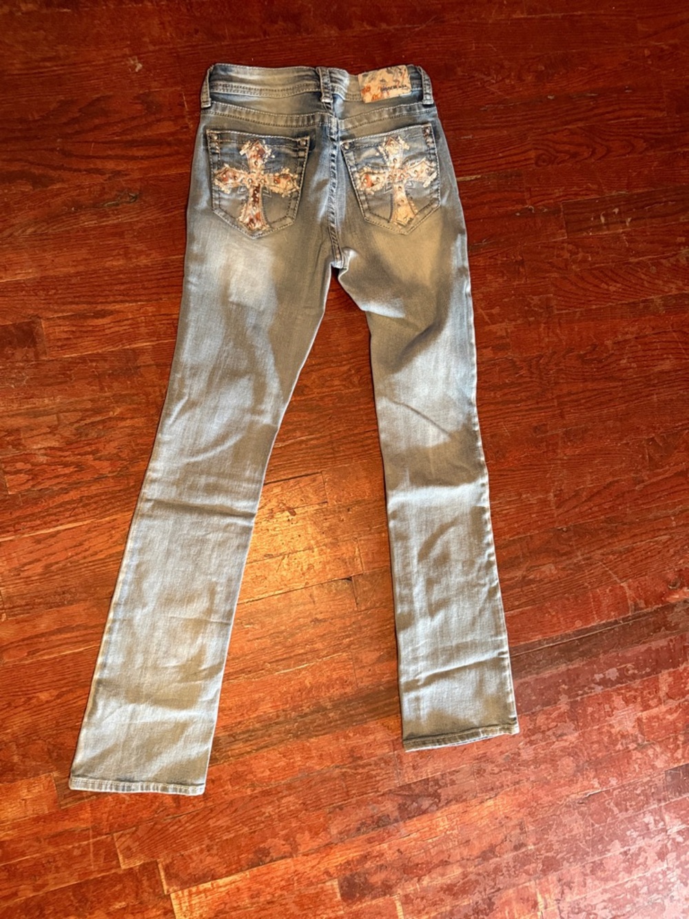 Grace in LA Light Blue Flare Jeans with Cross Pocket Embellishments